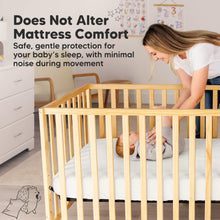 Load image into Gallery viewer, Quiet waterproof crib mattress protector that preserves mattress comfort with minimal noise.