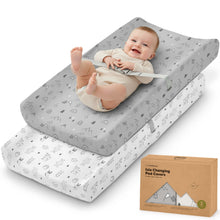 Load image into Gallery viewer, Isla changing pad covers, 2-pack, shown with a baby lying on top of the padded changing mat.