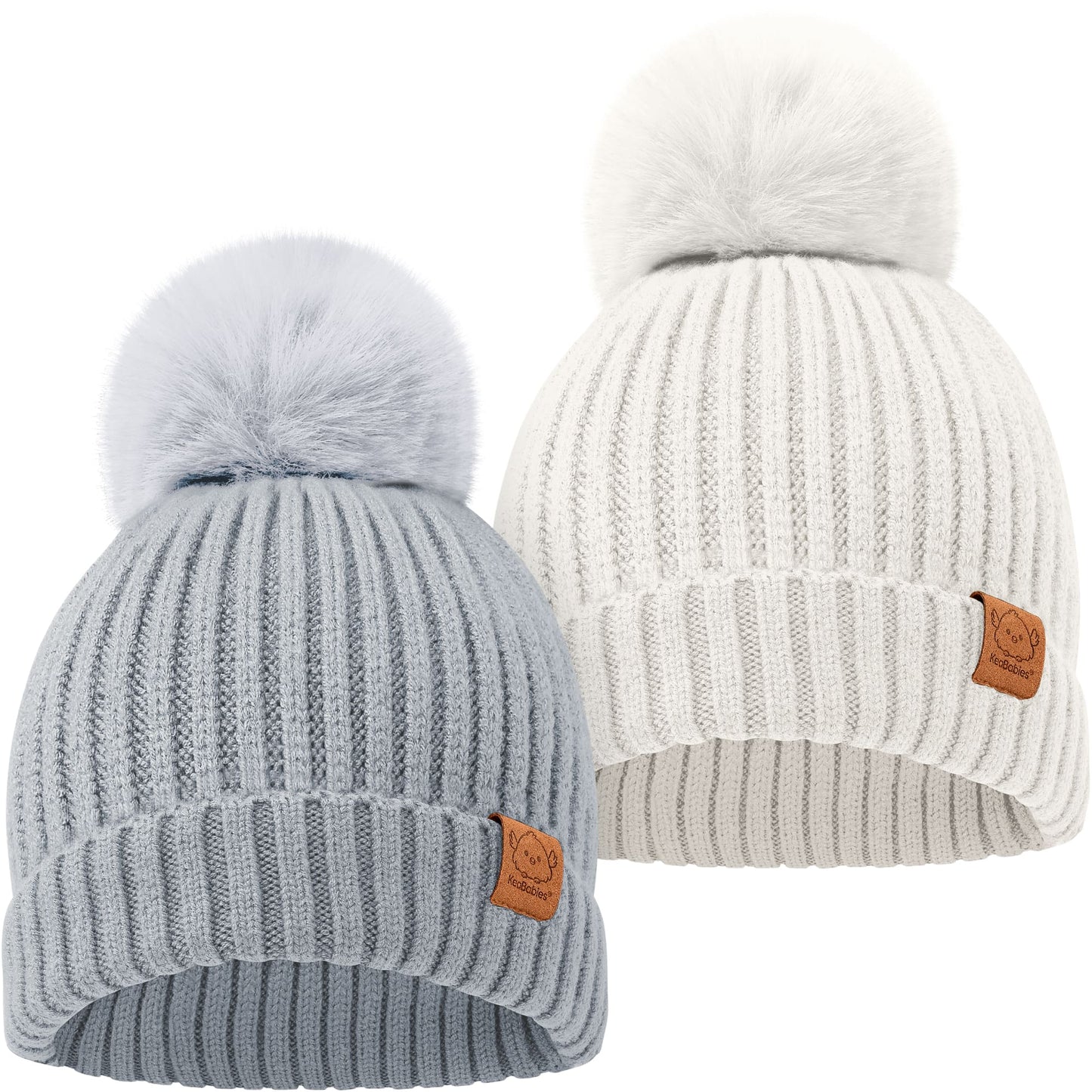 Two cozy knitted baby beanies with soft pom-pom tops
 28060628254906