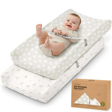 Load image into Gallery viewer, Isla changing pad covers, 2-pack, shown with a baby lying on top of the padded changing mat.
