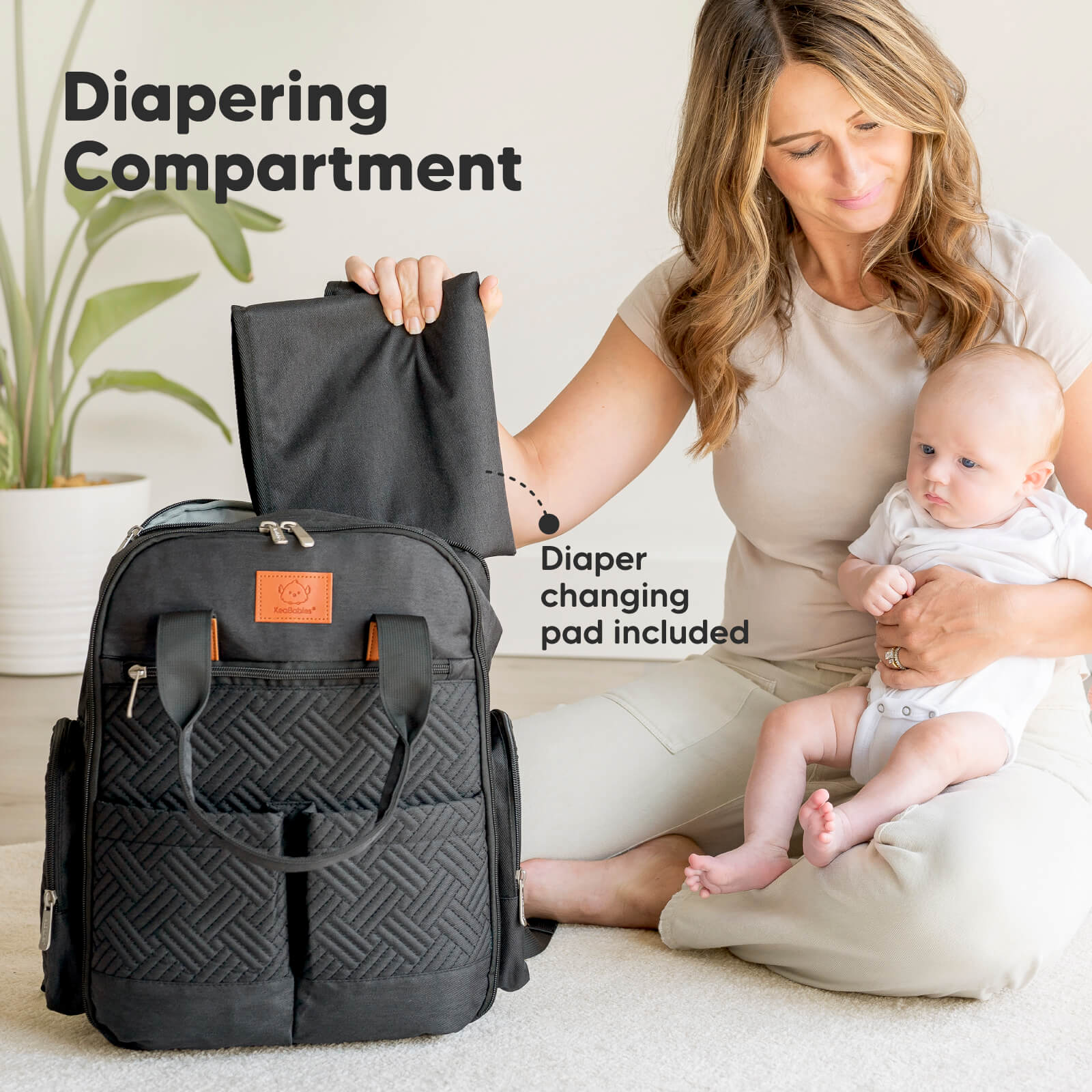 Diapering Compartment: Diaper changing pad included
 26032740958394
