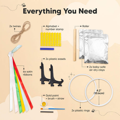 Everything You Need: 2x twines, alphabet + number stamp, roller, 2x baby-safe air-dry clays, 2x plastic easels, 6x satin ribbons, gold paint + brush + straw, 2x plastic rings (4.2" / 10.6 cm)