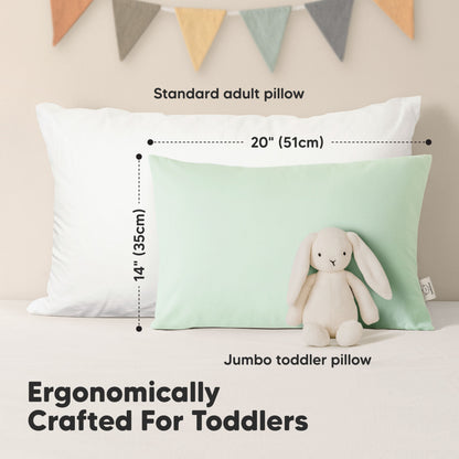 Ergonomically crafted for toddlers with jumbo toddler pillow size compared to standard adult pillow.
 30709967978682