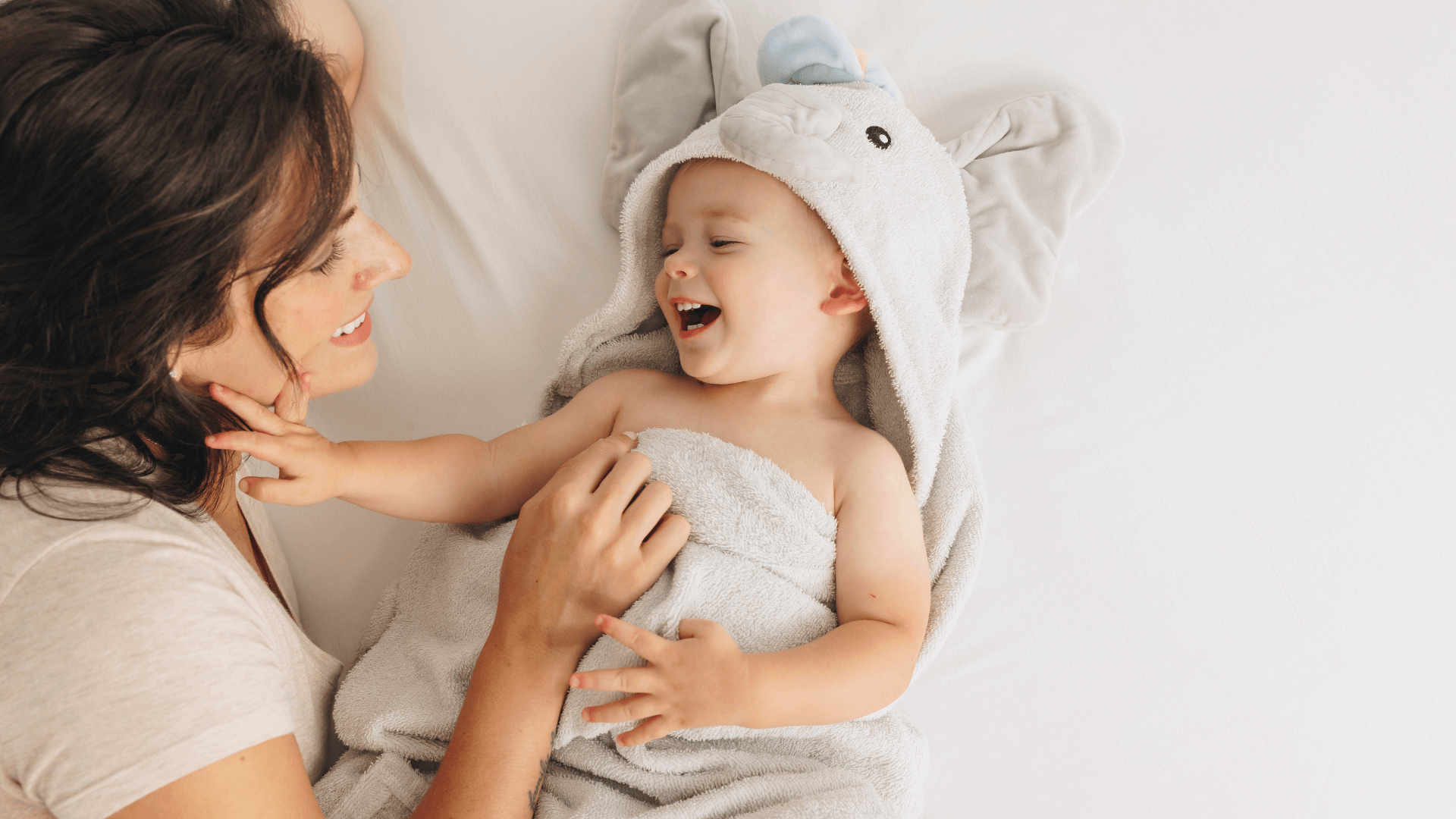 lifestyle video of the playpals hooded towel.